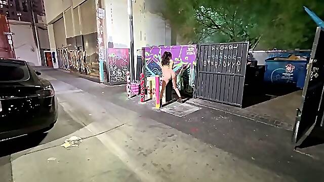 Slutty brunette MILF Nicole Niagara masturbates on parking at night