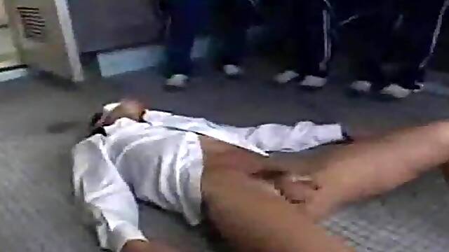 Japanese babe gets a hot handjob in a CFNM scene